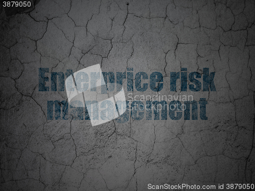 Image of Finance concept: Enterprice Risk Management on grunge wall background