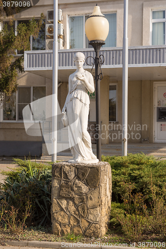 Image of Sennoy, Russia - March 15, 2016: statue in front of the main office of the wine fanagoria plant, village Sennoy, Mira Street 49