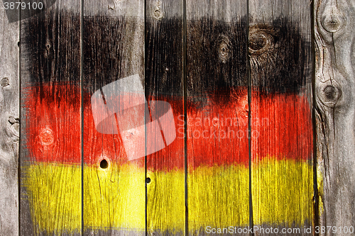 Image of german colors on old wooden wound