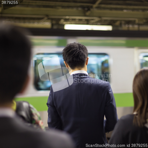 Image of Passengers traveling by Tokyo metro.