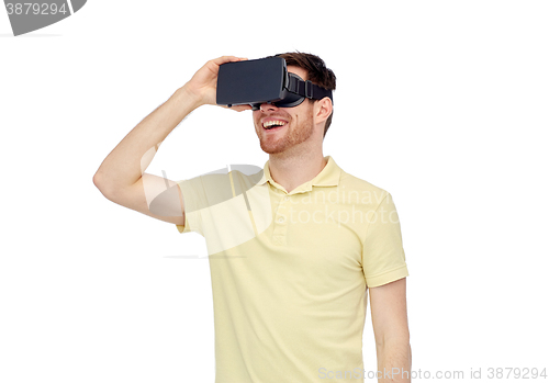 Image of happy man in virtual reality headset or 3d glasses