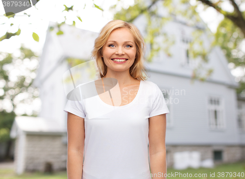 Image of smiling woman in blank white t-shirt