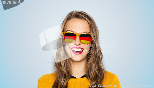 Image of happy young woman or teen girl in sunglasses