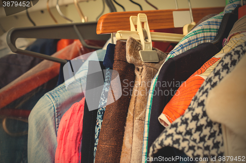 Image of clothes on hangers