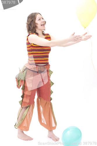 Image of Colorful dressed female with two balloons II