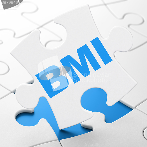 Image of Healthcare concept: BMI on puzzle background