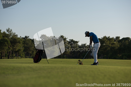 Image of golfer hitting long shot