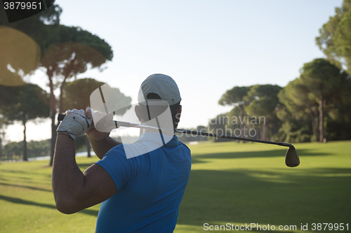 Image of golf player hitting shot