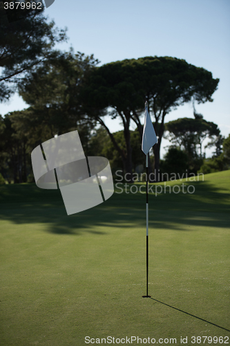 Image of golfer hitting a sand bunker shot