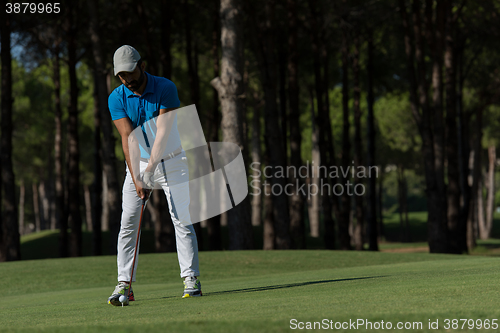 Image of golf player hitting shot