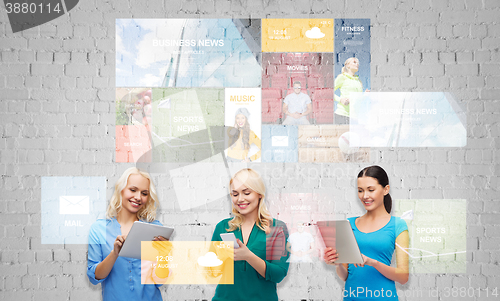 Image of happy women with smartphone and tablet pc computer