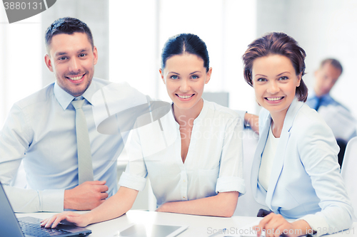 Image of business team working in office