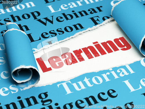 Image of Studying concept: red text Learning under the piece of  torn paper
