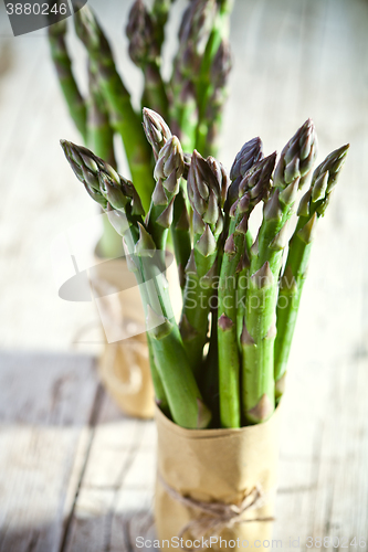 Image of two bunches of fresh asparagus 