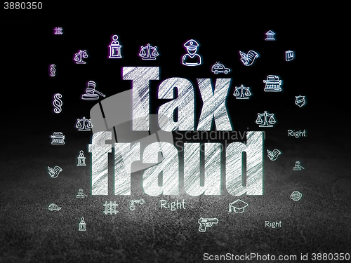 Image of Law concept: Tax Fraud in grunge dark room