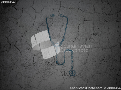 Image of Medicine concept: Stethoscope on grunge wall background