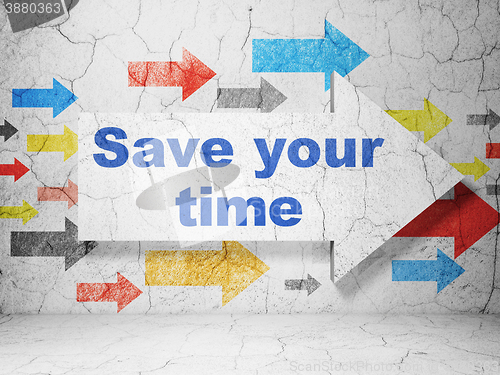 Image of Time concept: arrow with Save Your Time on grunge wall background