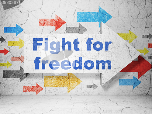 Image of Political concept: arrow with Fight For Freedom on grunge wall background