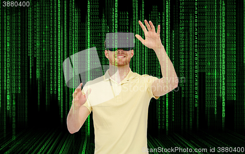 Image of happy man in virtual reality headset or 3d glasses