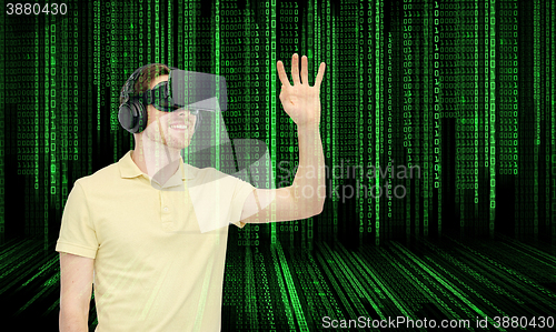 Image of happy man in virtual reality headset or 3d glasses