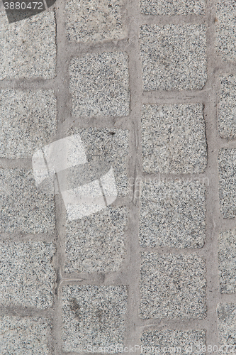 Image of close up of paving stone or facade tile texture