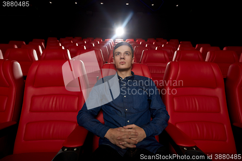 Image of young man watching movie in 3d theater