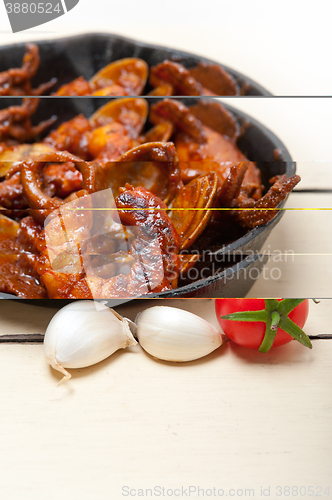 Image of fresh seafoos stew on an iron skillet