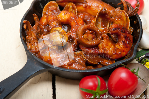 Image of fresh seafoos stew on an iron skillet