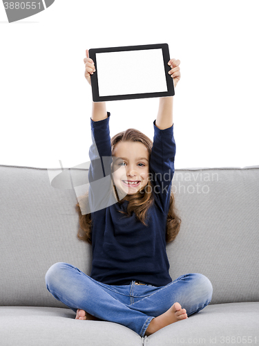Image of Little girl with a tablet
