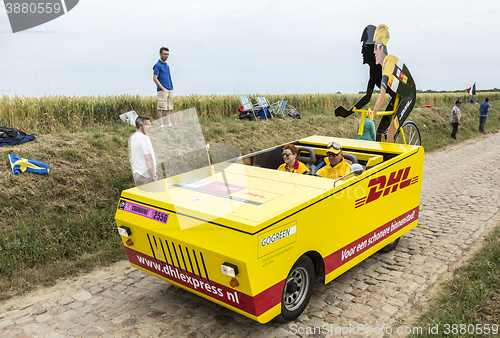 Image of DHL Vehicle on a Cobblestone Road- Tour de France 2015