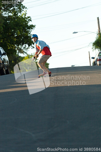 Image of Longboarder Teen Skating