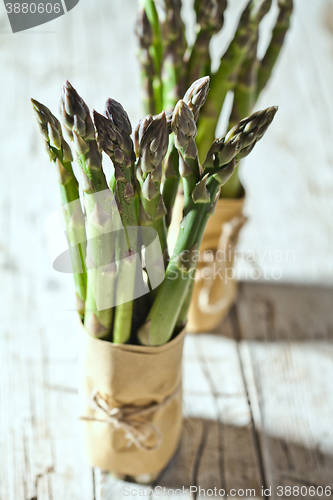 Image of two bunches of fresh asparagus