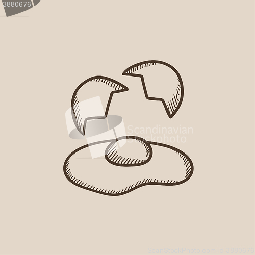Image of Broken egg and shells sketch icon.