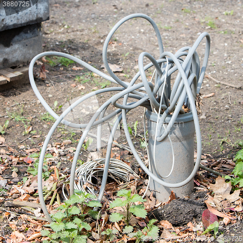 Image of Cables coming out from the ground