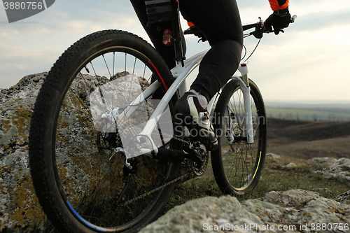 Image of Man cyclist riding the bicycle