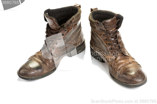 Image of Dirty old boots isolated. white background