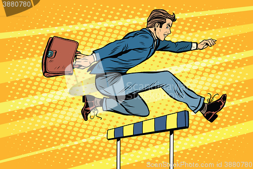 Image of Businessman running hurdles