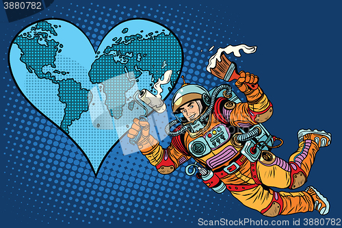 Image of Environment day, Earth heart and the astronaut