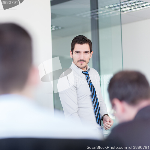 Image of Relaxed informal business team office meeting.