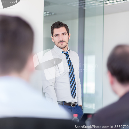 Image of Relaxed informal business team office meeting.