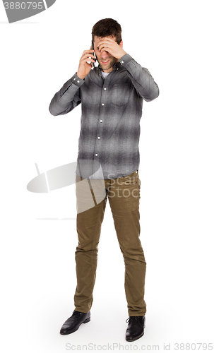 Image of Caucasian man on the phone - confusing phone call