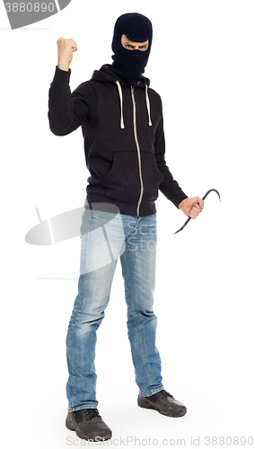 Image of Thief with metal crowbar