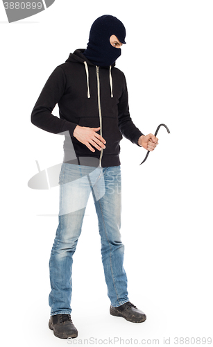 Image of Thief with metal crowbar