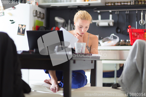 Image of Female freelancer working from home.