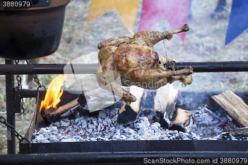 Image of Roasting Chicken on spit
