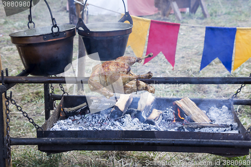 Image of Roasting Chicken on spit