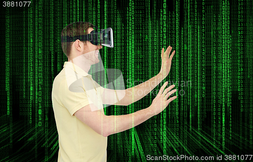 Image of happy man in virtual reality headset or 3d glasses