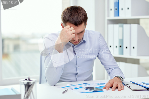 Image of close up of businessman with smartphone