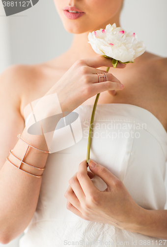 Image of close up of beautiful woman with ring and bracelet