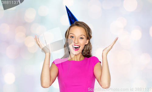 Image of happy young woman or teen girl in party cap